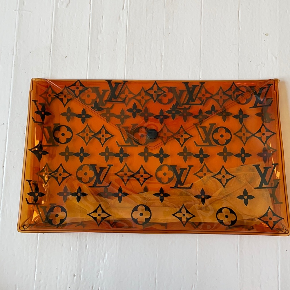 Brand New Authentic Louis Vuitton Orange PVC Bag.